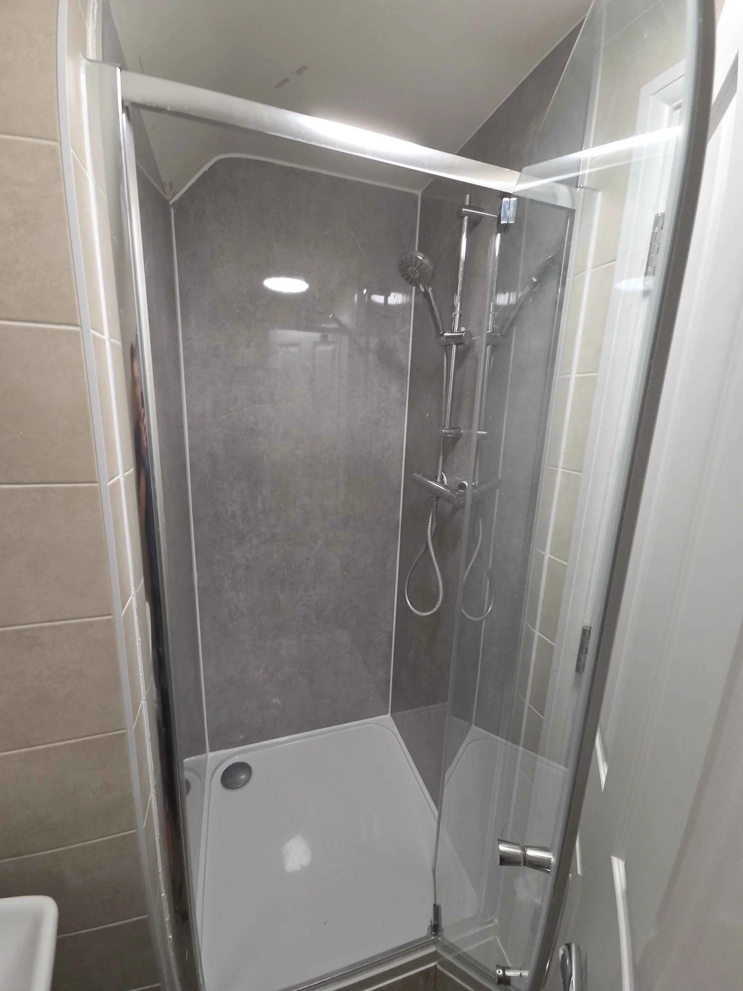En Suite Bathroom Leak Repair and Panel Installation