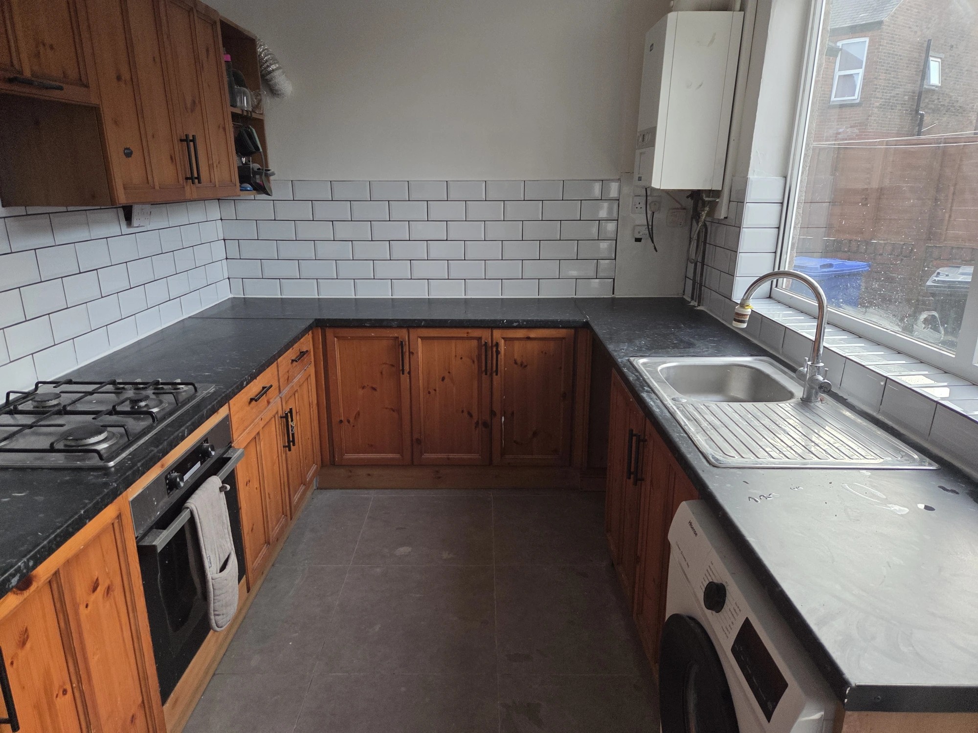 Kitchen Refurbishment, New Splash Back Tiles and Wall Repaired